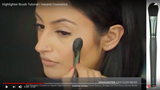 A girl applying highlighter using Vasanti Highlighter - Easy Glow Brush - Screenshot from Youtube video
